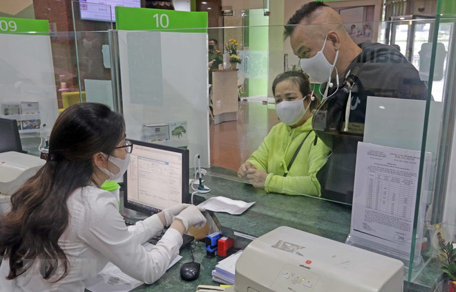 Reference exchange rate down 10 VND on May 20 ảnh 1