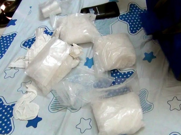 Hanoi customs agency discuss ways to prevent drug trafficking ảnh 1