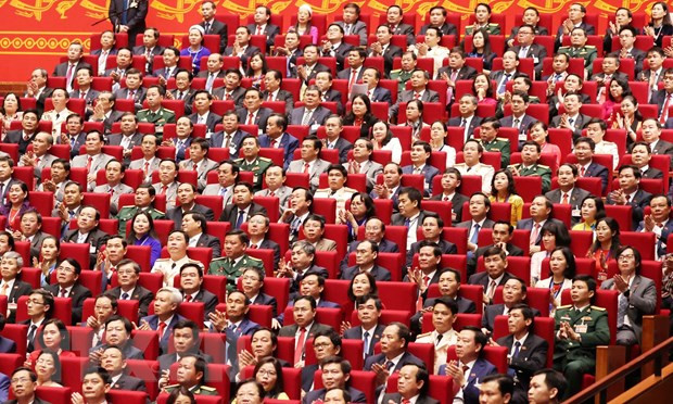 Congress delegates discuss documents on third working day ảnh 1