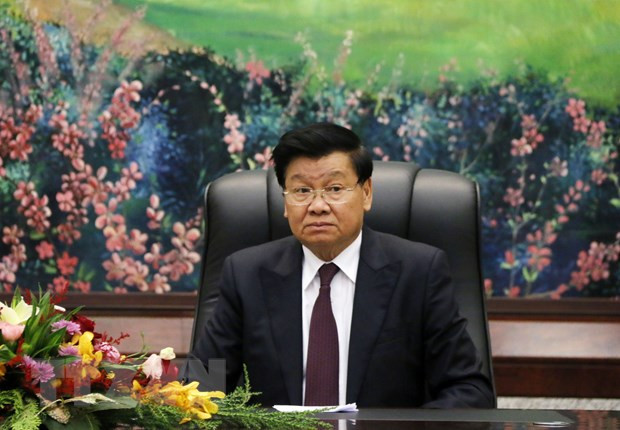 Lao leader thanks Vietnam for support in COVID-19 fight ảnh 1