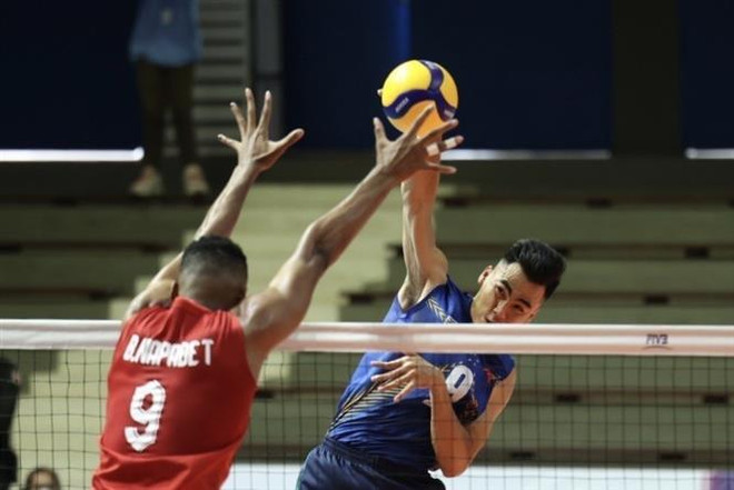Volleyball striker Tu Thanh Thuan smashes points record at SEA Games 32 ảnh 1