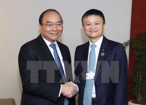 Prime Minister meets with int’l finance and business executives ảnh 2