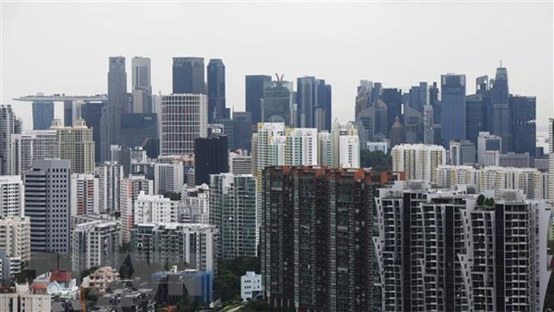 Forecasters revise up Singapore’s inflation ảnh 1
