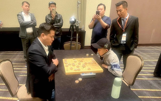 Vietnamese player defends championship at world xiangqi tournament ảnh 1