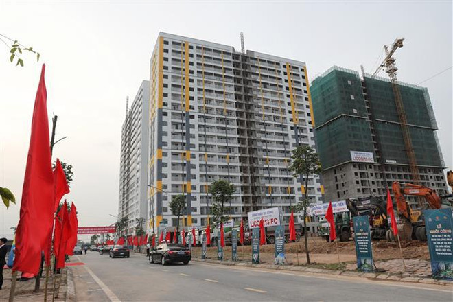 PM attends inauguration of bridge, groundbreaking of social housing project in Bac Giang ảnh 2 PM attends inauguration of bridge, groundbreaking of social housing project in Bac Giang ảnh 2