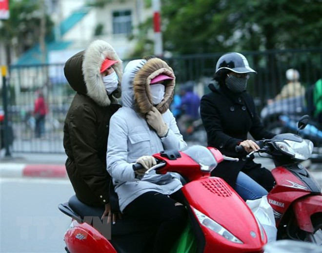 Cold spell hits northern region, temperatures drop sharply ảnh 1