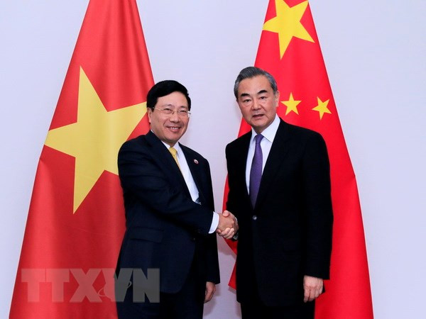 Foreign Ministers of Vietnam, China hold talks in Laos ảnh 1