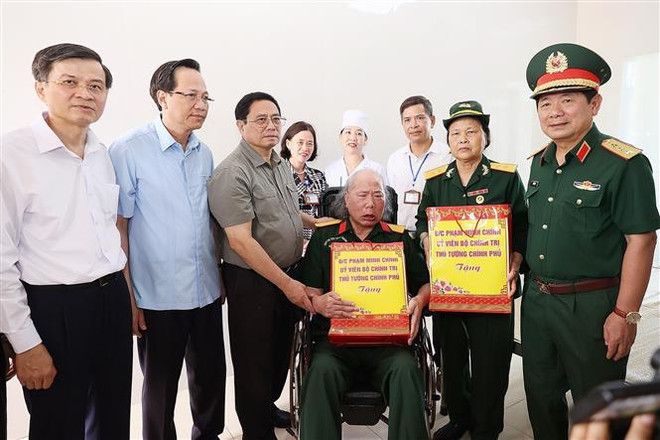 PM calls for joint efforts to take care of sick soldiers, war invalids, revolution contributors ảnh 2 PM calls for joint efforts to take care of sick soldiers, war invalids, revolution contributors ảnh 2