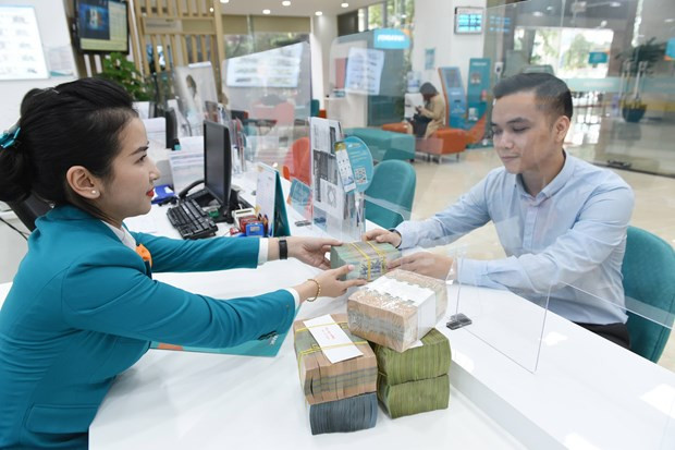 Reference exchange rate down 10 VND on July 27 ảnh 1