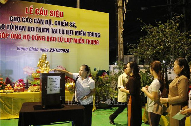 Laos: Requiem held for people killed in flooding in central Vietnam ảnh 2 Laos: Requiem held for people killed in flooding in central Vietnam ảnh 2