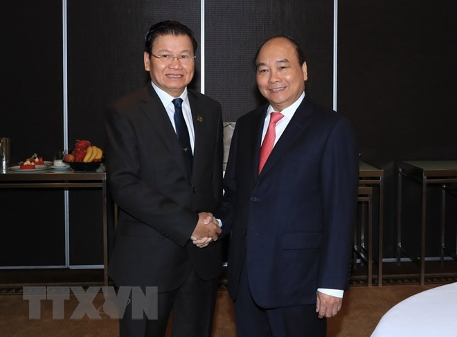 Vietnamese, Lao PMs meet on ASEAN-Australia Special Summit sidelines ảnh 1