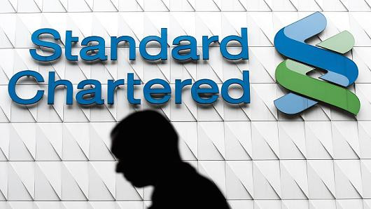 Singapore fines Standard Chartered Bank, Trust ảnh 1