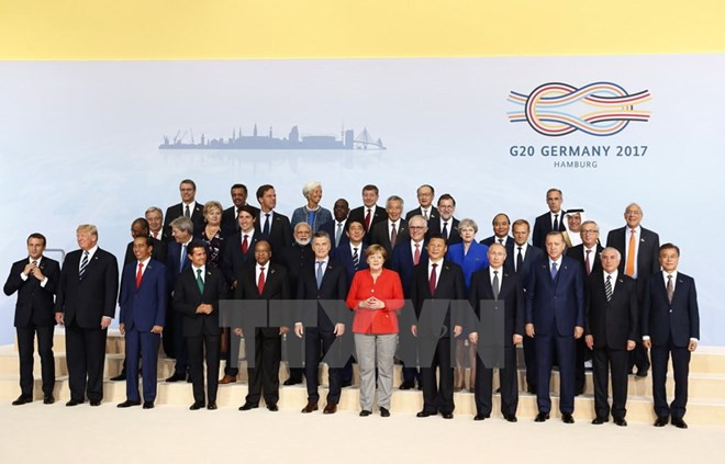 PM Nguyen Xuan Phuc tells G20 int’l cooperation vital to climate change fight ảnh 1