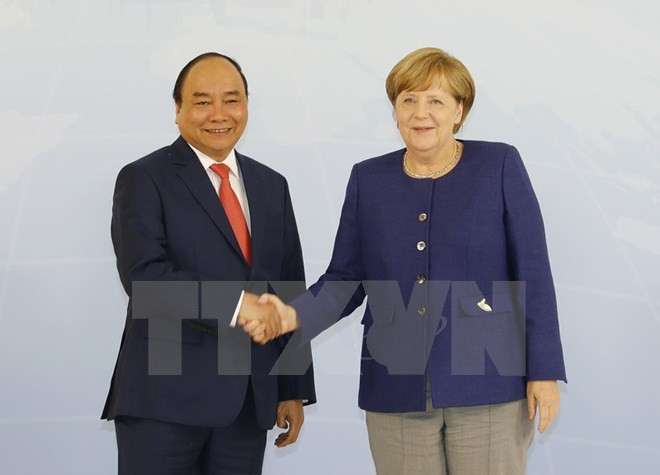 Prime Minister Nguyen Xuan Phuc talks with German counterpart ảnh 1 Prime Minister Nguyen Xuan Phuc talks with German counterpart ảnh 1