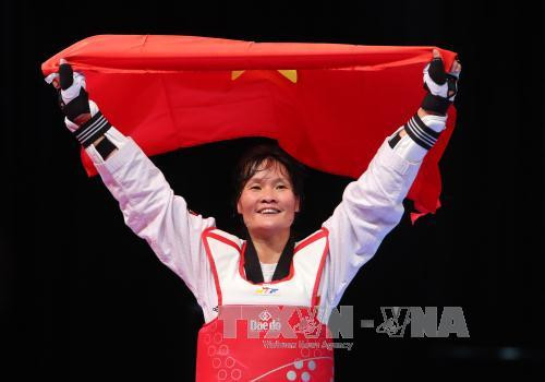 Sea Games 29: Vietnam wins gold in Taekwondo ảnh 1