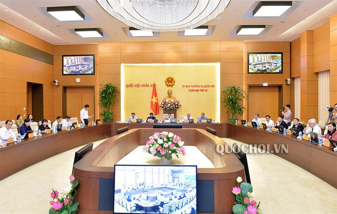 Legislators comment on Government’s development reports ảnh 1