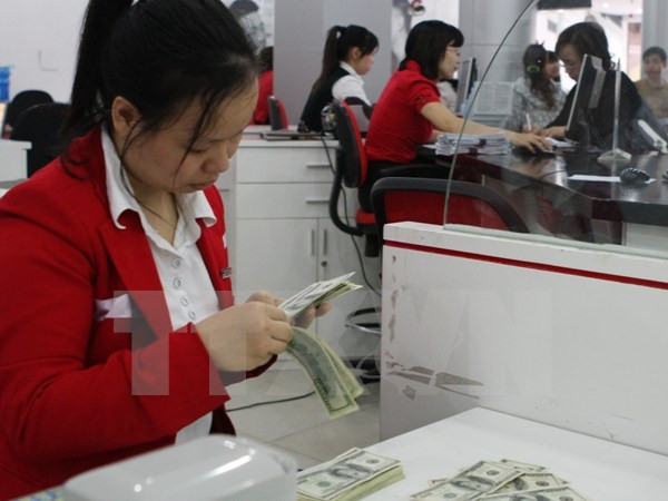 Central bank widens VND/USD trading band ảnh 1 Central bank widens VND/USD trading band ảnh 1