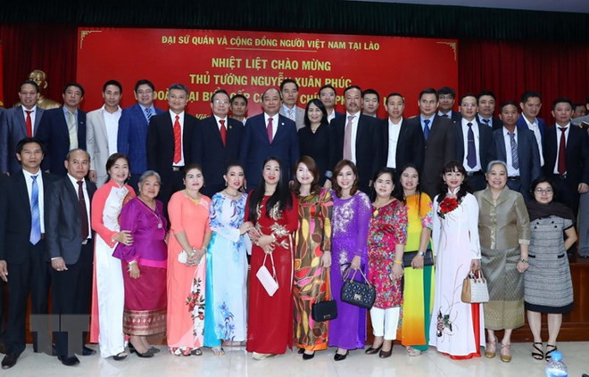 Vietnamese, Lao PMs join traditional Tet celebration in Vientiane ảnh 1