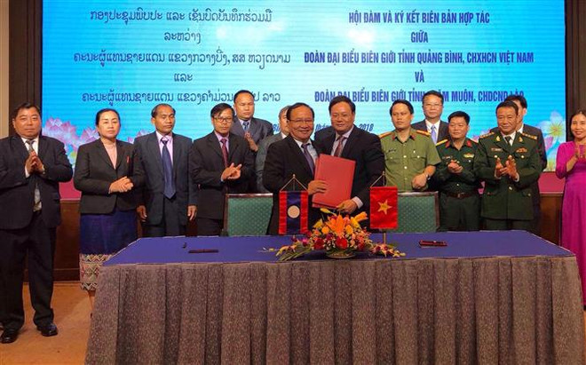 Quang Binh enhances border defence-security cooperation with Lao province ảnh 1