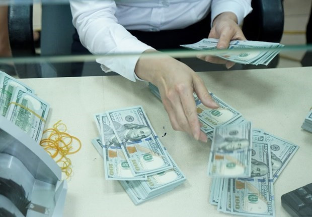 Reference exchange rate down 7 VND on May 12 ảnh 1 Reference exchange rate down 7 VND on May 12 ảnh 1