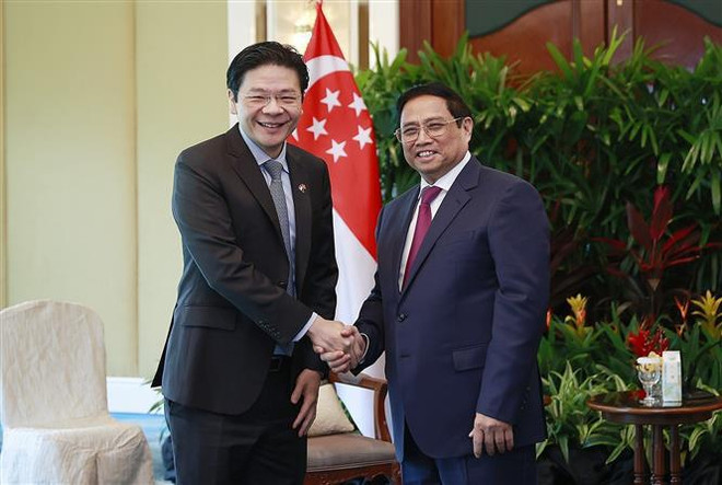 Prime Minister Pham Minh Chinh meets with Singaporean Deputy PM ảnh 1 Prime Minister Pham Minh Chinh meets with Singaporean Deputy PM ảnh 1
