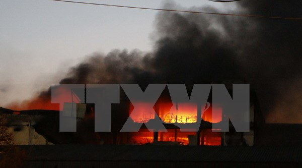 Massive blaze destroys Taiwanese garment factory in Can Tho ảnh 1