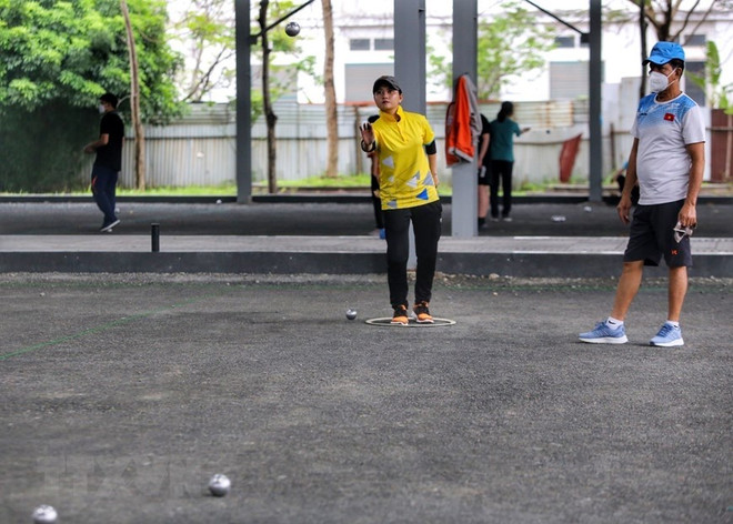 Vietnam petanque team overcomes difficulty to compete at SEA Games ảnh 4