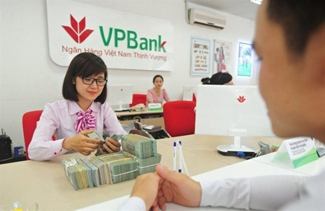 Bank credit growth recovers partly in March ảnh 1