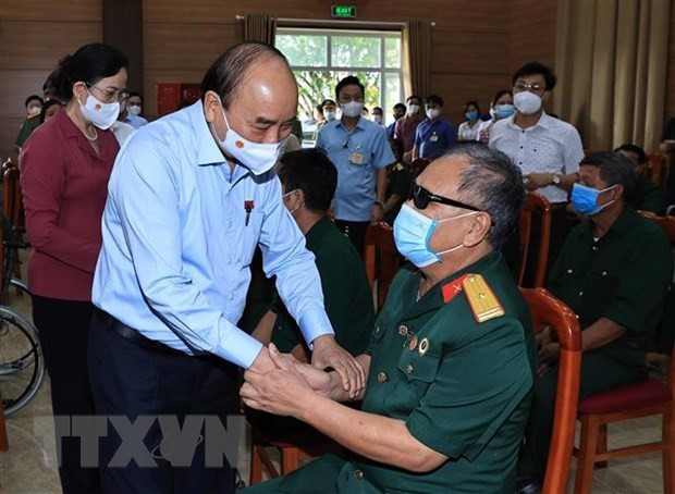 Tet gifts to be presented to revolution contributors ảnh 1