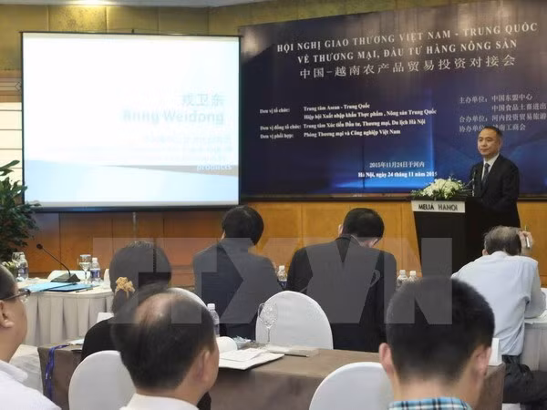 Vietnamese, Chinese farm produce traders meet in Hanoi ảnh 1