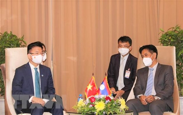 Vietnam, Laos seek to beef up trade, industry and justice ties ảnh 2