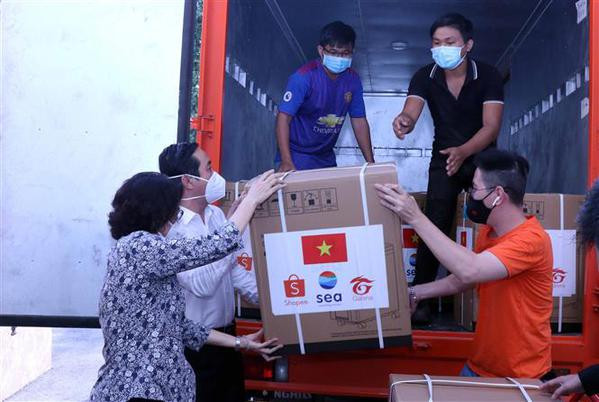 MIC launches programme to support COVID-19 hit people in HCM City ảnh 1