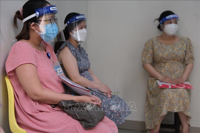 HCM City begins COVID-19 inoculation for expectant women ảnh 1 HCM City begins COVID-19 inoculation for expectant women ảnh 1