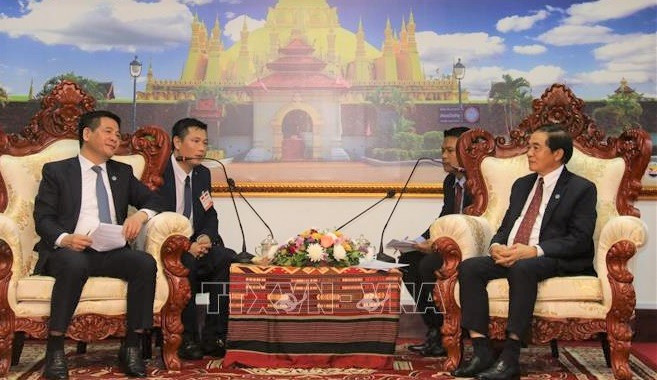 Vietnam, Laos seek to beef up trade, industry and justice ties ảnh 1