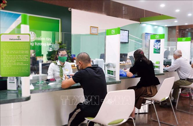 Major banks continue to reduce deposit interest rates ảnh 1