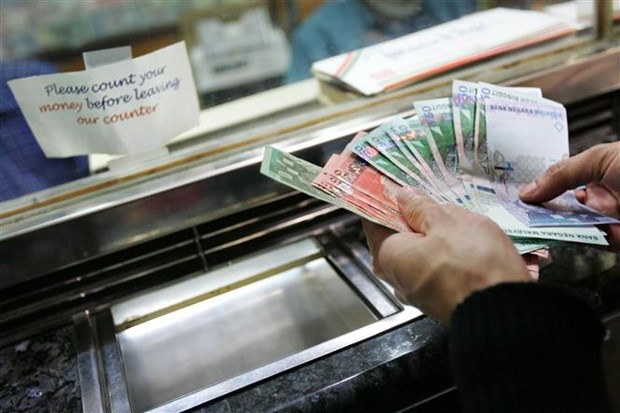 Malaysia’s GDP grows by record high in two decades ảnh 1