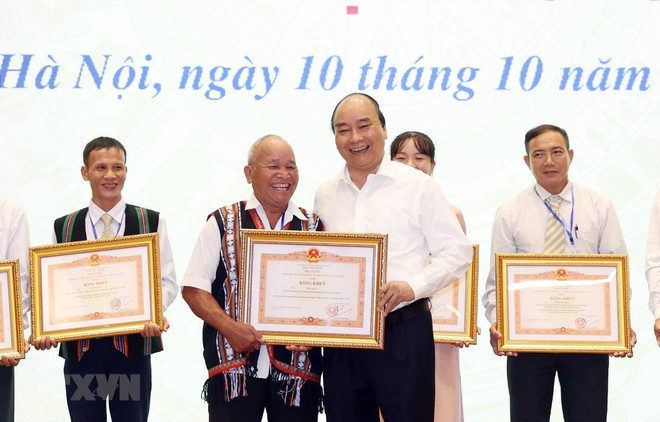 PM lauds role models in mass mobilisation ảnh 1