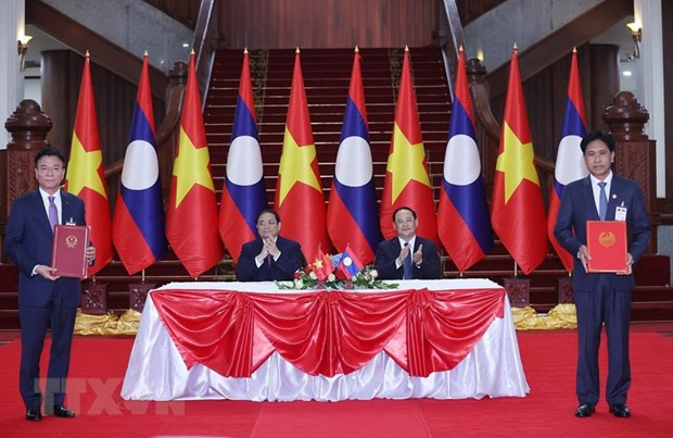 Vietnam, Laos sign judicial assistance agreement on civil affairs ảnh 1 Vietnam, Laos sign judicial assistance agreement on civil affairs ảnh 1