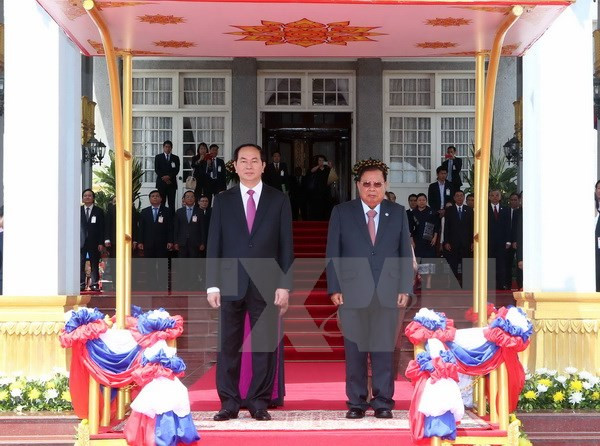 President Tran Dai Quang starts State visit to Laos ảnh 1