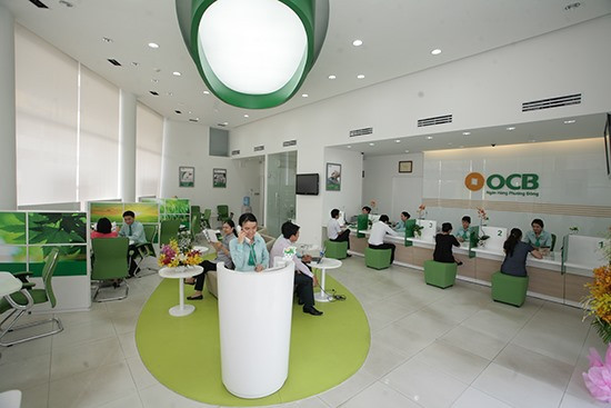 Vietcombank sells out OCB stake at auction ảnh 1