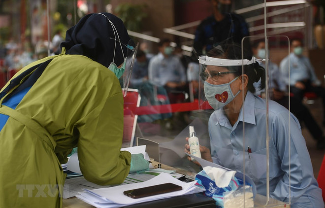 Indonesia, Malaysia record new COVID-19 cases ảnh 1