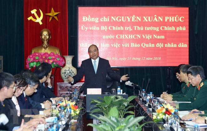 PM hails Quan doi Nhan dan newspaper for national contributions ảnh 1 PM hails Quan doi Nhan dan newspaper for national contributions ảnh 1