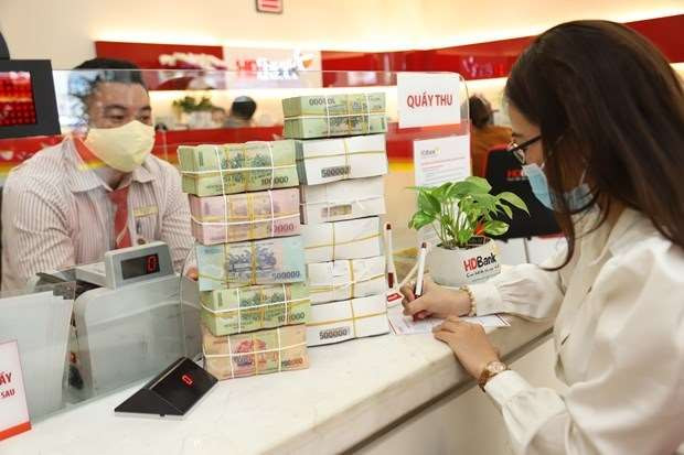 Reference exchange rate up 32 VND at week’s beginning ảnh 1