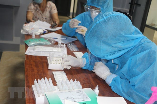 Over 91,900 new COVID-19 cases confirmed on March 27 ảnh 1