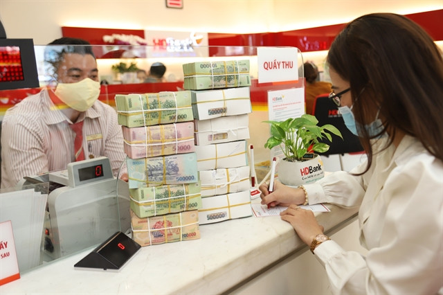 Monetary stance points to only mildly higher interest rates in VN: Fitch Ratings ảnh 1 Monetary stance points to only mildly higher interest rates in VN: Fitch Ratings ảnh 1