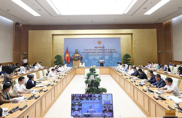 PM chairs conference on social housing development ảnh 1