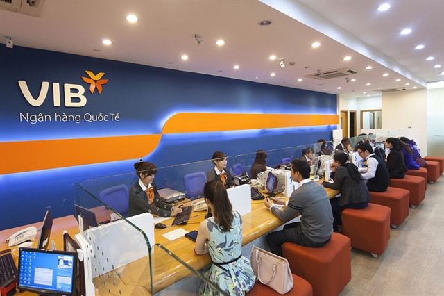 Banks offer free services to lure customers ảnh 1 Banks offer free services to lure customers ảnh 1