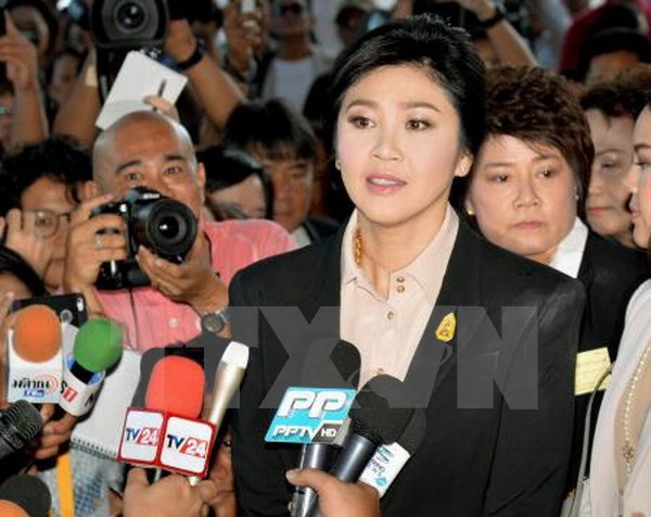 Former Thai PM appears before court for rice subsidy trial ảnh 1