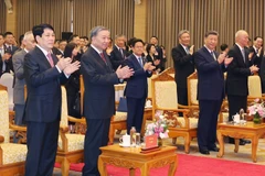 PM Pham Minh Chinh (centre) and delegates kick off the Green Growth Exhibition in Hanoi on April 16. (Photo: VNA)