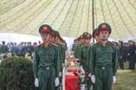 Remains of Vietnamese fallen soldiers and experts are brought to be reburied at Tong Khao Martyrs’ Cemetery in Thanh Nua commune, Dien Bien province, on December 31. (Photo: VNA)